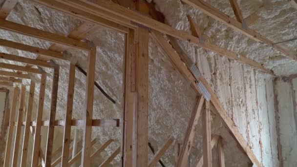 Termal insulation installing at the attic insulation the house — Stock Video
