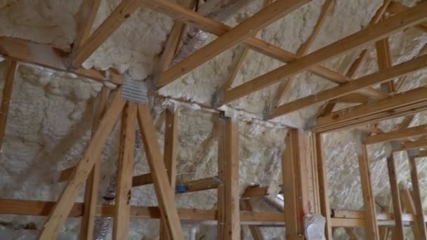 Termal insulation installing at the attic insulation the house — Stock Video