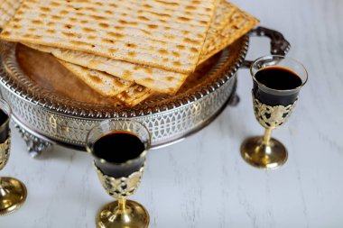 Matzo for Passover with on seder plate on close up clipart
