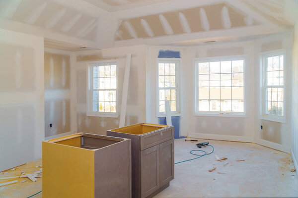room drywalls with plasterboards at a residential building under construction