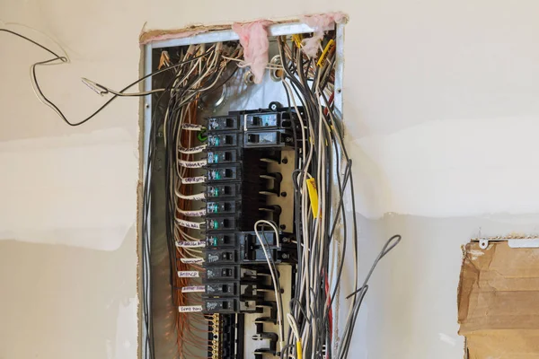 Electrical cabinet with circuit breaker on the mounting panel holders the wires in cable