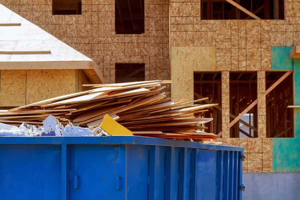 Residential view of new houses being built and construction garbage — Stock Photo, Image