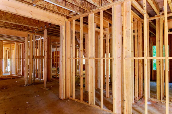 Close-up of beam built home under construction with wooden truss, post and beam framework. Timber frame house, real estate background — Stock Photo, Image