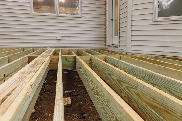 Installing deck boards with above ground deck, patio construction. — Stock Photo, Image