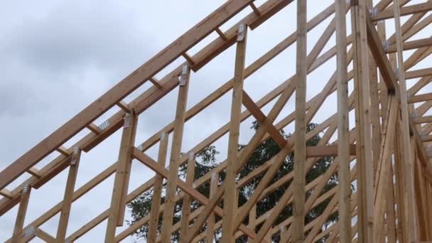 House timber frame for a progressing house a new development timber — Stock Video