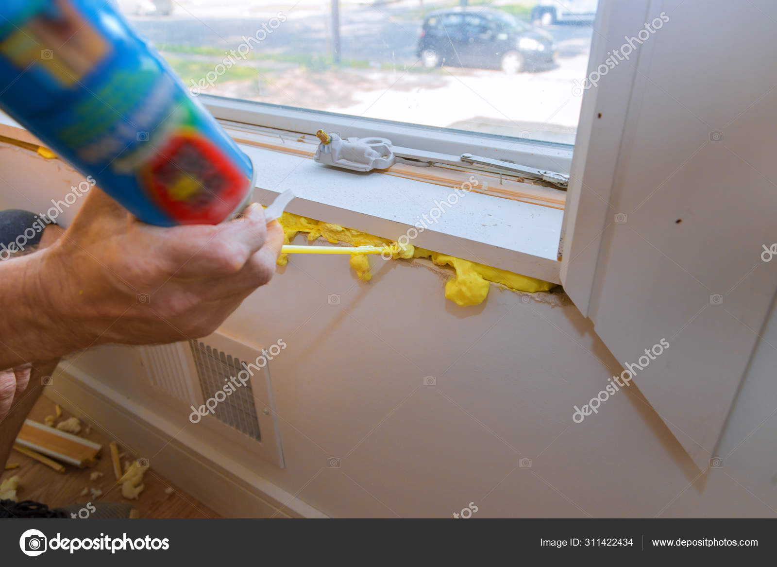 Construction PU foam in the window installed using a mounting installation  foam Stock Photo by ©photovs 311422434