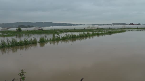 Campo inundado com fazenda após fortes chuvas tempestade — Vídeo de Stock