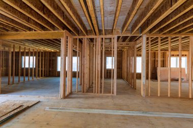Interior view of a house under construction home framing clipart