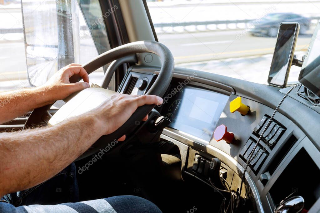 Truck drivers big truck of driver's hands on big truck steering wheel