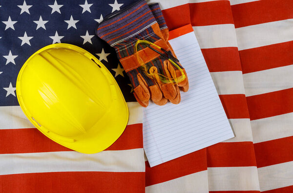 Happy labor day in the yellow hard hat construction helmet leather gloves of United States America