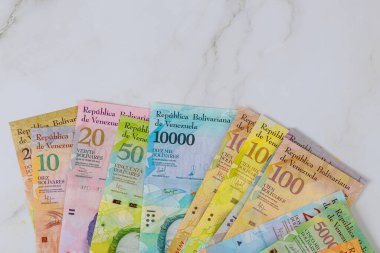 Venezuela economic of banknotes with different paper bills currency Venezuelan Bolivar, clipart