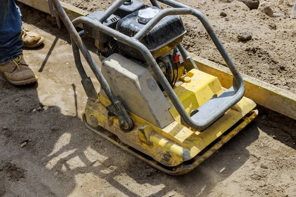 Vibratory Plate Compactor Tool Construction Compacting Sand Sidewalk — Stock Photo, Image