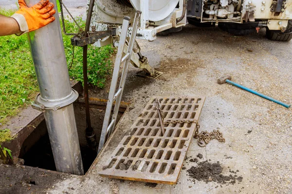 Cleaning the sewer system special equipment on utility service in the town.