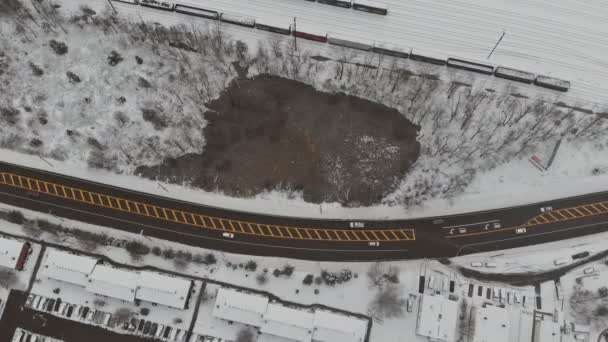 Aerial view over the sleeping area and road view from panorama cover from snow — Stock Video