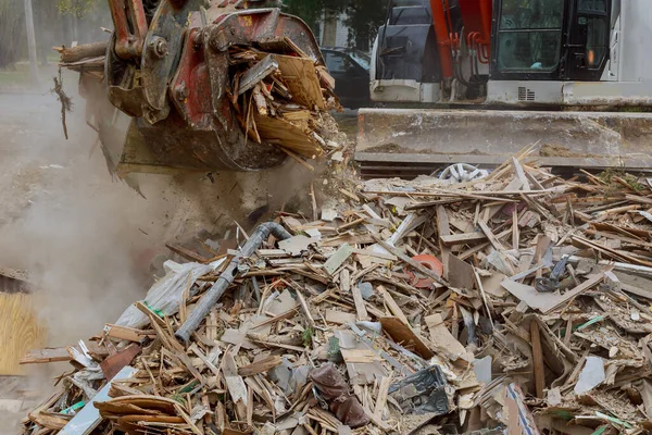 Caused by demolition of wooden house in trash debris outside of neighborhoods devastated by hurricane