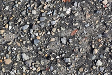 çakıl taşları ile eski asfalt doku