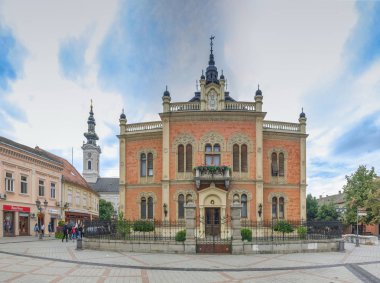Novi Sad, Serbia - 07-18-2018. Panoramic View of the  Bishop Palace in Novi Sad, Serbia in a cloudy summer day clipart