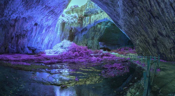 Mystical cave in bright fantastic colors — Stock Photo, Image