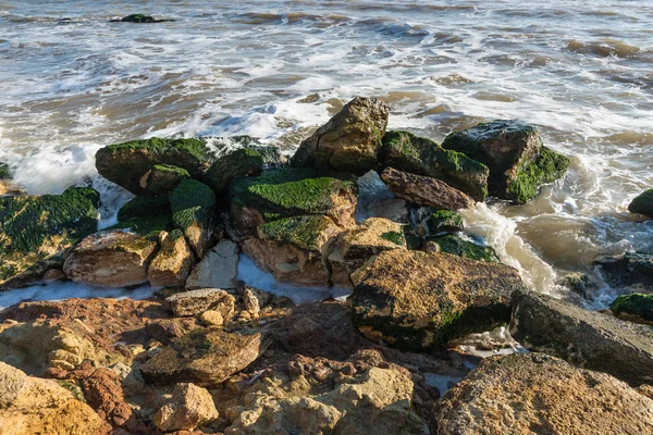 Piedras en el borde del mar — Foto de Stock