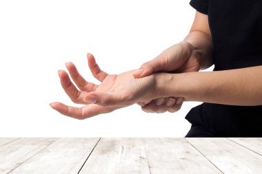 Woman holding her hand - pain concept  clipart