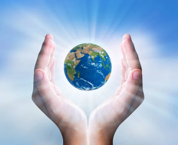 Hands Holding Small Earth Stock Picture