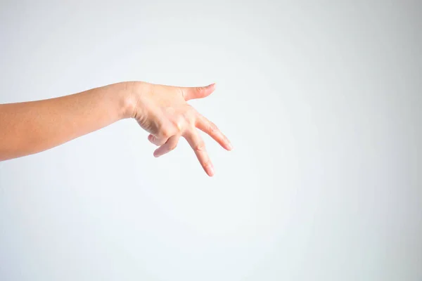 Hand showing thumb, forefinger and middle finger for gesturing like rapper singer.