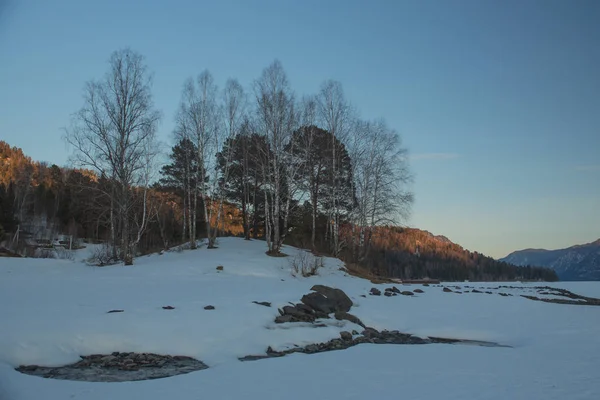 Sunset winter snow nature river horizon landscape. Winter snow forest river sunset view. Sunset winter river snow. Winter sunset river