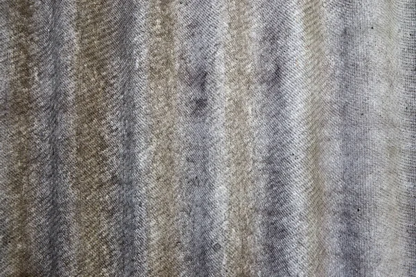 Fondo gris áspero. Textura de pizarra ondulada. Ondas verticales . —  Fotos de Stock