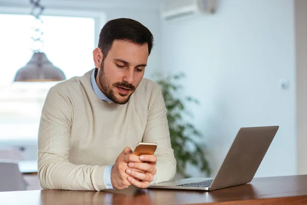 Handsome Man Using Mobile Phone Home — Stock Photo, Image