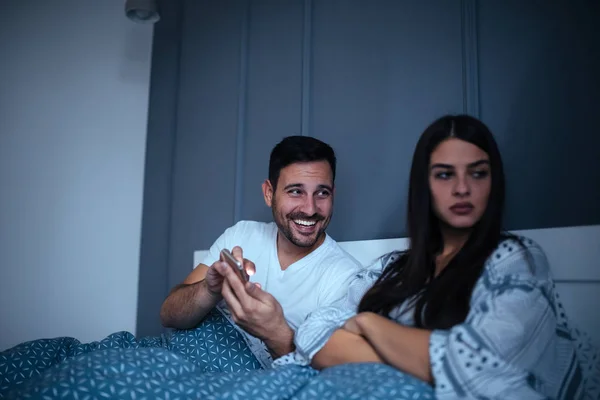 Husband Sharing Some Information His Much Less Excited Wife Bed — Stock Photo, Image
