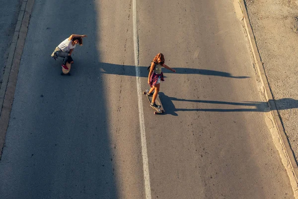 Two Friends Driving Long Board Road — Stock Photo, Image