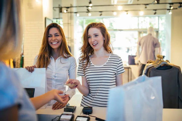 Portrait Two Satisfied Woman Paying Credit Card Cash Register Store — Stock Photo, Image