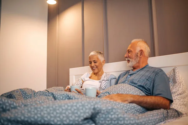 Senior Couple Enjoying Morning Coffee Together Bed — Stock Photo, Image