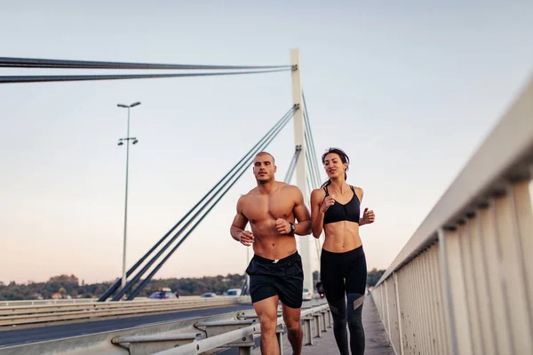 Athlete Couple Running Together Outdoors — Stock Photo, Image