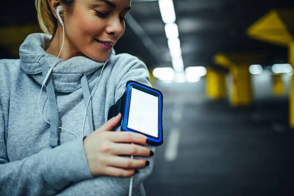 Attractive Young Woman Checking Her Playlist Run — Stock Photo, Image