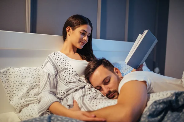 Young Cute Man Has Fallen Asleep While His Wife Reading — Stock Photo, Image