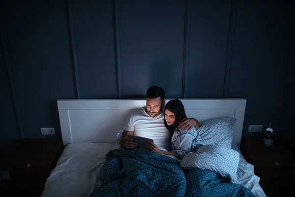 Cute Young Couple Watching Movie Tablet While Bed Night — Stock Photo, Image