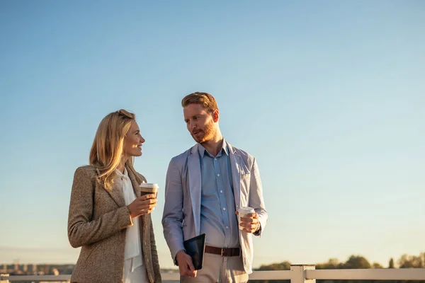 Two Business People Walking Discussing Office Woman Holding Coffee While — Stock Photo, Image