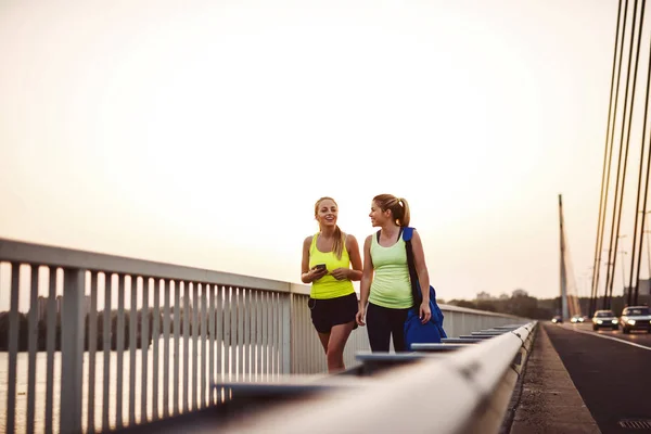 Athletic Young Females Walking Long Training Bridge — Stock Photo, Image