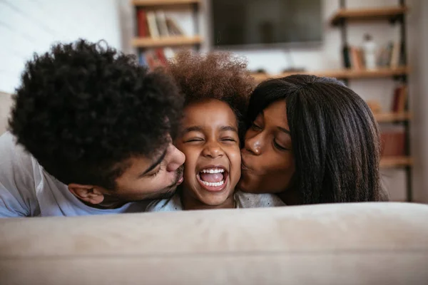 Close Portrait Happy Little Girl Receiving Kisses Mom Dad — Stock Photo, Image