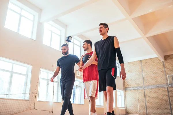 Portrait of three basketball players