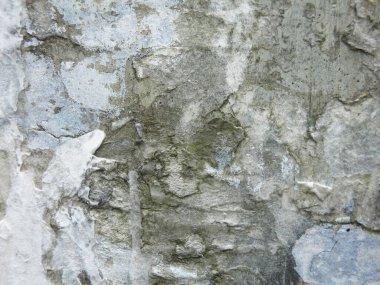 Kirli sert beton yüzey, çizikler ve reklam kırıntıları, vahşi ve sert arka plan