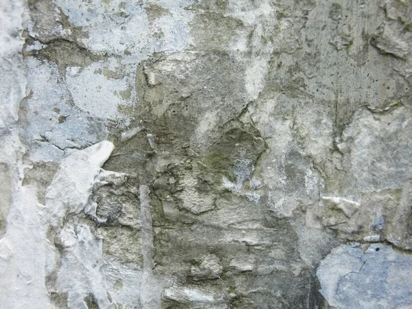 Kirli sert beton yüzey, çizikler ve reklam kırıntıları, vahşi ve sert arka plan