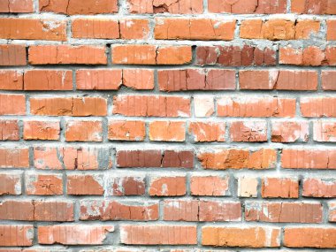 Çatı katında vahşi bir arka plan için ahırın tuğla kırmızı duvarı