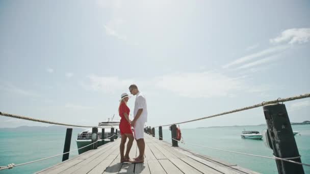 Loving couple meeting on a pier — Stock Video