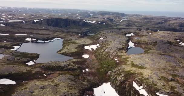 Aerial view of small lakes hidden in rocky mountains, — Stock Video