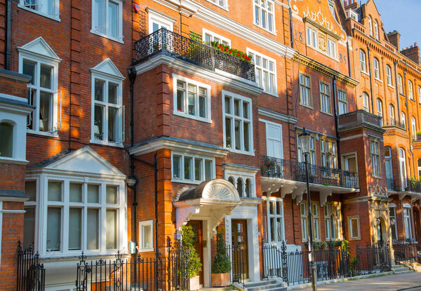 London, UK - August 25, 2017: Residential aria of Kensington and Chelsea. Cadogan gate with row of periodic buildings. Luxury property in the centre of London.