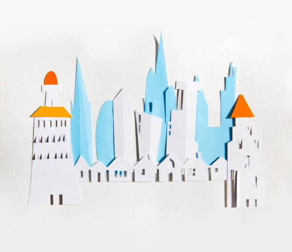 Modern City, skyscrapers and town houses. Property and house buying concept. Paper cut design background.