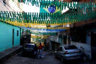 salvador, bahia / brazil - june 6, 2014: street view decorated with pennants and Brazilian flag in the neighborhood of Sao Marcos in the city of Salvador. 