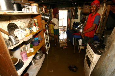 itabuna, bahia / brazil - october 25, 2011: waters of the Cachoeira River floods residence in the city of Itabuna.